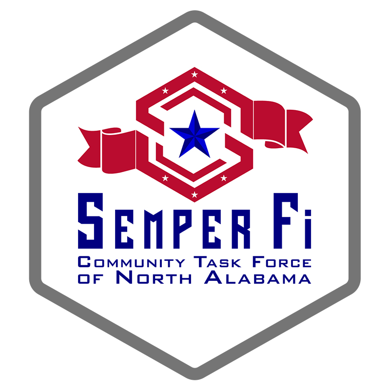 Semper Fi Community Task Force Logo, stacked vertically inside grey hexagon; logo is red double hexagon with blue star, text says Semper Fi Community Task Force of North Alabama