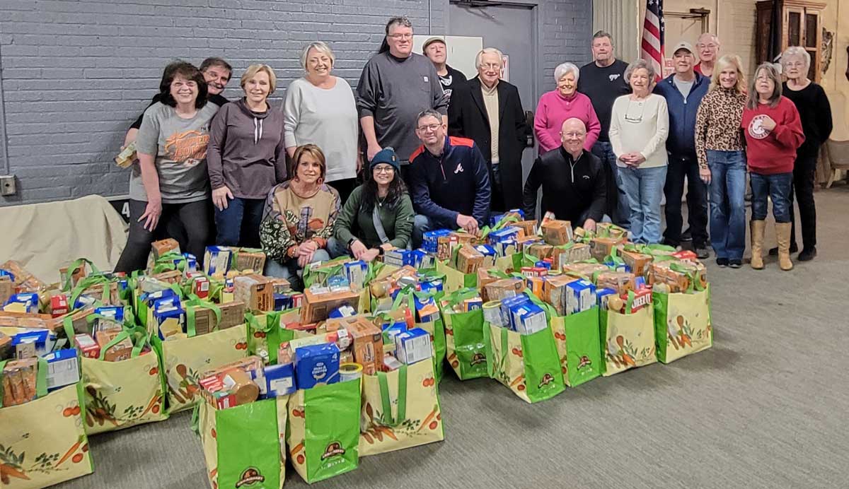 Group Photo with Packed Bags from Food Donation from Huntsville Elks Lodge #1648 for Distro to Local Veterans 
